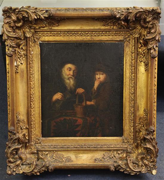 Flemish School Interior with a man and boy seated at a table 12 x 10.5in.